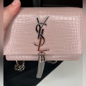 SAINT LAURENT
Pompom Kate leather crossbody bag